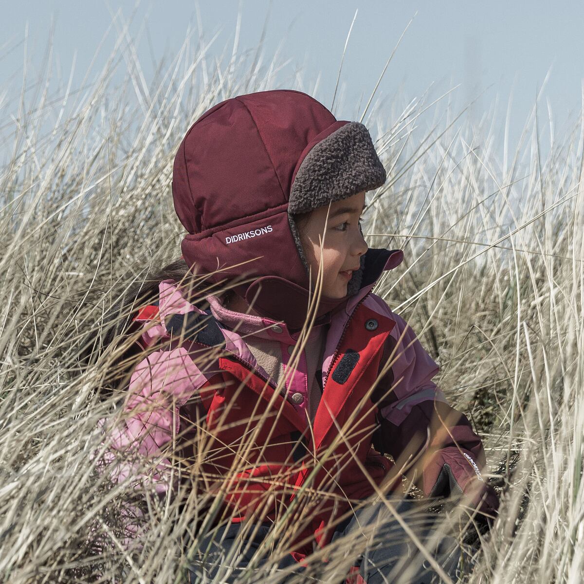 Didriksons Dětská zimní čepice Biggles anemon red